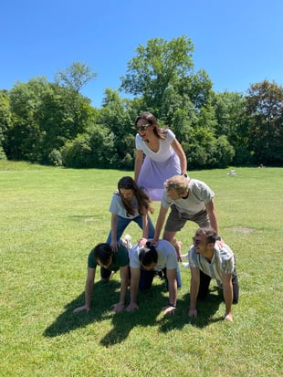 The Glint Solar team enjoys a sunny day outdoors.